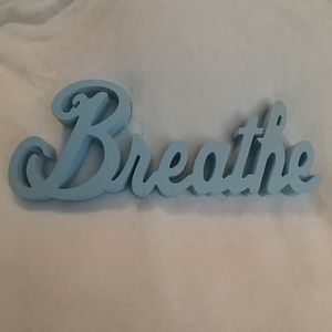 Wooden sign "Breathe"